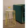 Image de Table ronde en mÃ©tal dorÃ© avec plateau dorÃ© Ã 37X58 cm