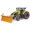 Image de Claas axion 950 avec chaînes à neige et