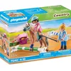 Image de Country cavalière et cheval avec monitri