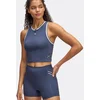 Image de Under Armour Run 96 Débardeur Tank Top Femmes-Bleu Foncé,Blanc, Taille XL