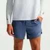 Image de Nike Stride 5in Short de running Hommes - bleu gris, argent, Taille L