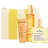 Image de NUXE SUN HUILE BRONZANTE VISAGE ET CORPS SPF 50 COFFRET 4 pièces