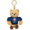 Image de Peluche - Ours Porte-clés Coupe Du Monde De Rugby / Rugby World Cup France 2023 - Peluche Officielle - 10 Cm Assis Beige