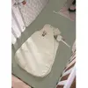Image de Gigoteuse Naissance En Lin - Botanica Vert