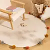 Image de Tapis Rond Avec Pompons - Arlequin Beige