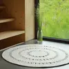 Image de Tapis Laine Feutrée Rond Ajourée Bibek Naturel