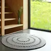 Image de Tapis Laine Feutrée Rond Ajourée Bibek Gris