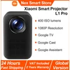 Image de Projecteur intelligent Xiaomi L1 Pro, 400 lumens ISO, Google TV, résolution physique 1080p, mise au point automatique et correction automatique de la distorsion trapézoïdale, audio Dolby