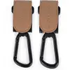 Image de Lot De 2 Crochets Pour Poussette Icon Caramel Taupe