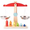 Image de Balance Avec Poids Rouge