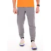 Image de Nike Dri-Fit Challenger Vêtements homme Gris/argent L