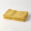 Image de TODAY Essential - Lot de 2 serviettes de toilette 50x90 cm 100% Coton coloris ocre