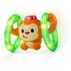 Image de Jouet interactif Bright Starts Roll & Glow Monkey avec effets lumineux et sonore