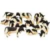 Image de Kids Globe 571929 lot de 12 vaches pied noir 1:32 - Kidsglobe 571929