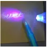 Image de Stylo encre invisible et lampe lumière UV