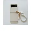 Image de Coque pour Samsung Galaxy Z Flip 3 FONGWAN avec Chaîne de perles - blanc