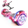 Image de SISIGAD Hoverboard avec Kart, Go Kart 6,5 Pouces, Hoverboard Tout Terrain Auto-équilibré avec Haut-parleurs Bluetooth et Lumières LED, Cadeau pour Enfants, Rose Camouflage en occasion ou reconditionné
