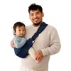 Image de Sac à dos porte-bébé Ergobaby Upsie Sling, sac à dos ergonomique pour bébés et tout-petits à partir de 6 mois (7,7 à 20,4 kg), changement spontané entre marcher et être porté dans les bras, bleu nuit en occasion ou reconditionné