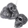 Image de 4 crânes métallisés décoratifs 12cm gris - 23627