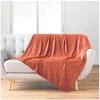 Image de Plaid flanelle relief unie Nelia terracotta 125x150