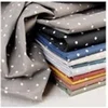 Image de Tissu coton imprimé pois blancs vendu au mètre(...) - poisrouge