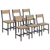 Image de Chaises industrielles en métal noir et bois