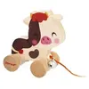 Image de Petite vache en bois a promener