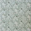 Image de Tissu coton Bio feuillage blanc vendu au mètre(...) - Vert