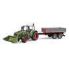 Image de Fendt Vario 211 avec chargeur frontal et remorque à ridelle