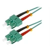 Image de Helos - Cordon de raccordement - SC multi-mode (M) pour SC multi-mode (M) - 1 m - fibre optique - duplex - 50 / 125 microns - OM3 - turquoise