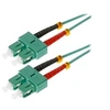 Image de Helos - Cordon de raccordement - SC multi-mode (M) pour SC multi-mode (M) - 20 m - fibre optique - duplex - 50 / 125 microns - OM3 - turquoise