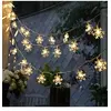 Image de Guirlande Lumineuse 3M LED avec 20 LED Flocon de neige pour Noël Soirée Maison Jardin, Blanc Chaud [Batterie alimenté]