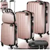 Image de Valises trolley rigides en ABS rose gold set 4 pièces roues pivotantes verrou 3 chiffres