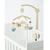 Image de Mobile musical bras bois Babou & Kendi