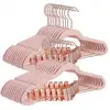 Image de 24 Cintres pinces velours rose