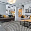 Image de Tapis effet laineux motif damier multicolore 133x170