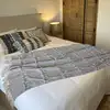 Image de Plaid en coton beige et noir 150cm