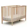 Image de Lit bébé pliant en bois hêtre verni 60 x 120 cm