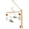 Image de Mobile musical bébé en bois avec 4 jouets