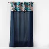 Image de Rideau uni top métallisé pompons bleu coton 140x240cm
