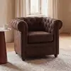 Image de Fauteuil capitonné en suédine marron