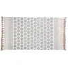 Image de Tapis en coton recyclé blanc motifs bleus à pompons 90x150
