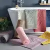 Image de Tapis de bain en coton orange terracotta 50x80cm