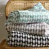 Image de Plaid en coton bleu aqua 150x150cm