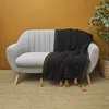 Image de Jeté de canapé surpiqué pompons noir 130x150cm
