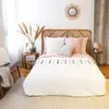 Image de Parure de lit à pompons colorés coton blanc / rose 220 x 240