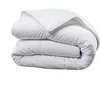 Image de Couette 220x240 cm fibres creuses polyester 160x200 cm
