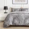 Image de Parure housse de couette + 2 taies à volant 100% coton 240x220 cm