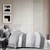 Image de Parure housse de couette + 2 taies à volant 100% coton 240x220 cm