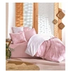 Image de Parure de lit - 1 housse de couette 140 x 200 cm + 2 taies d'oreiller 60 x 60 cm - 100% coton renforcé - Rose